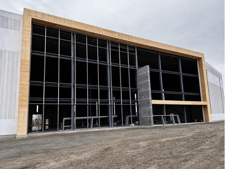 Commercial building exterior with framed window wall and fascia